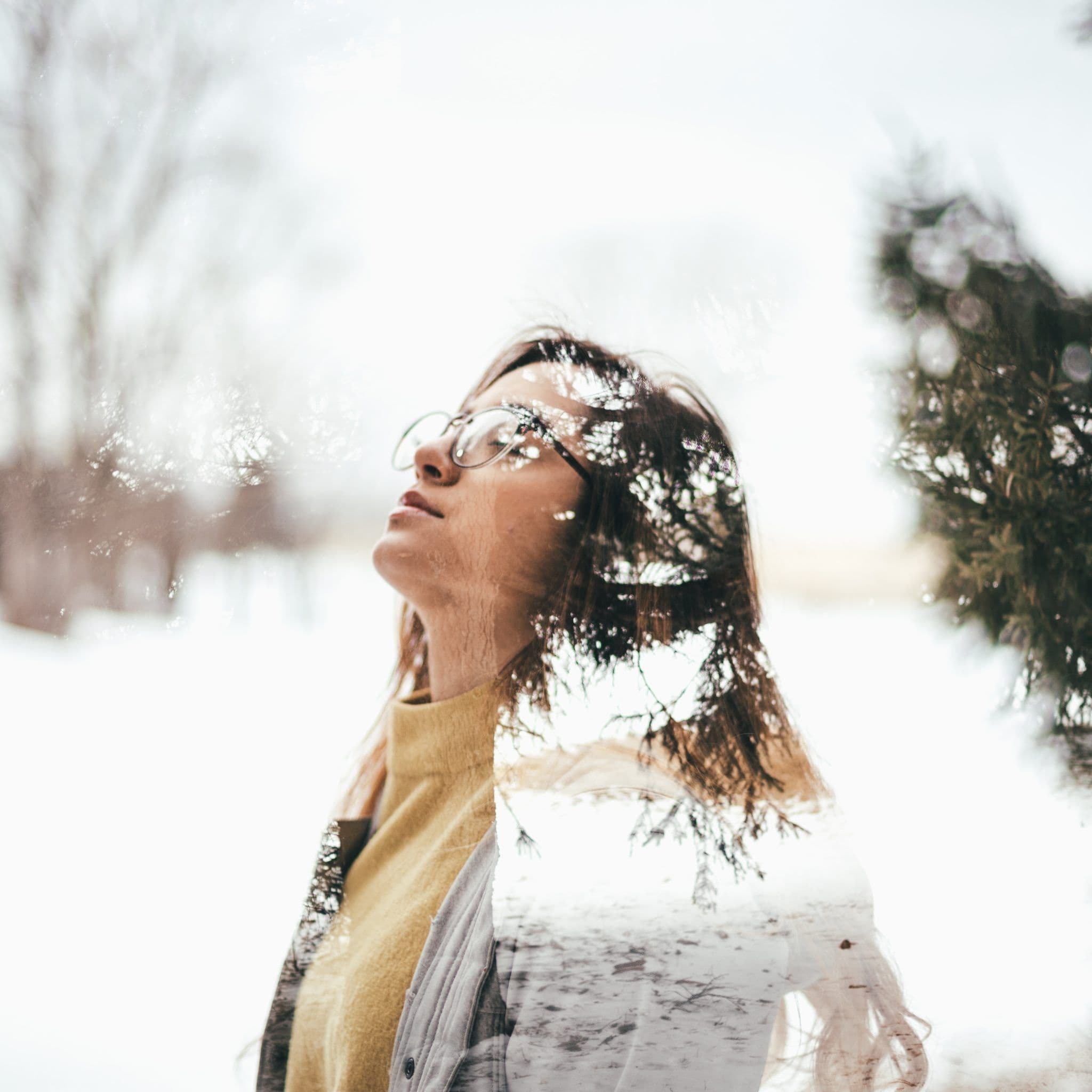 A woman's face in soft winter light